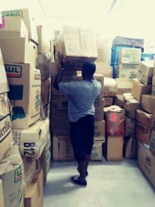 Same-day apartment movers in Fort Worth loading furniture near downtown Fort Worth